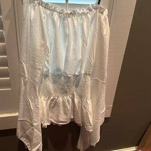Off the shoulder blouse. Flared sleeves. Large, white